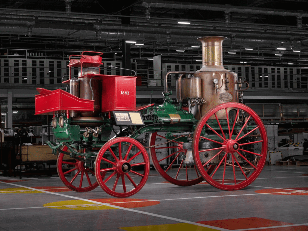 Ancienne machine à vapeur de 1863 rouge